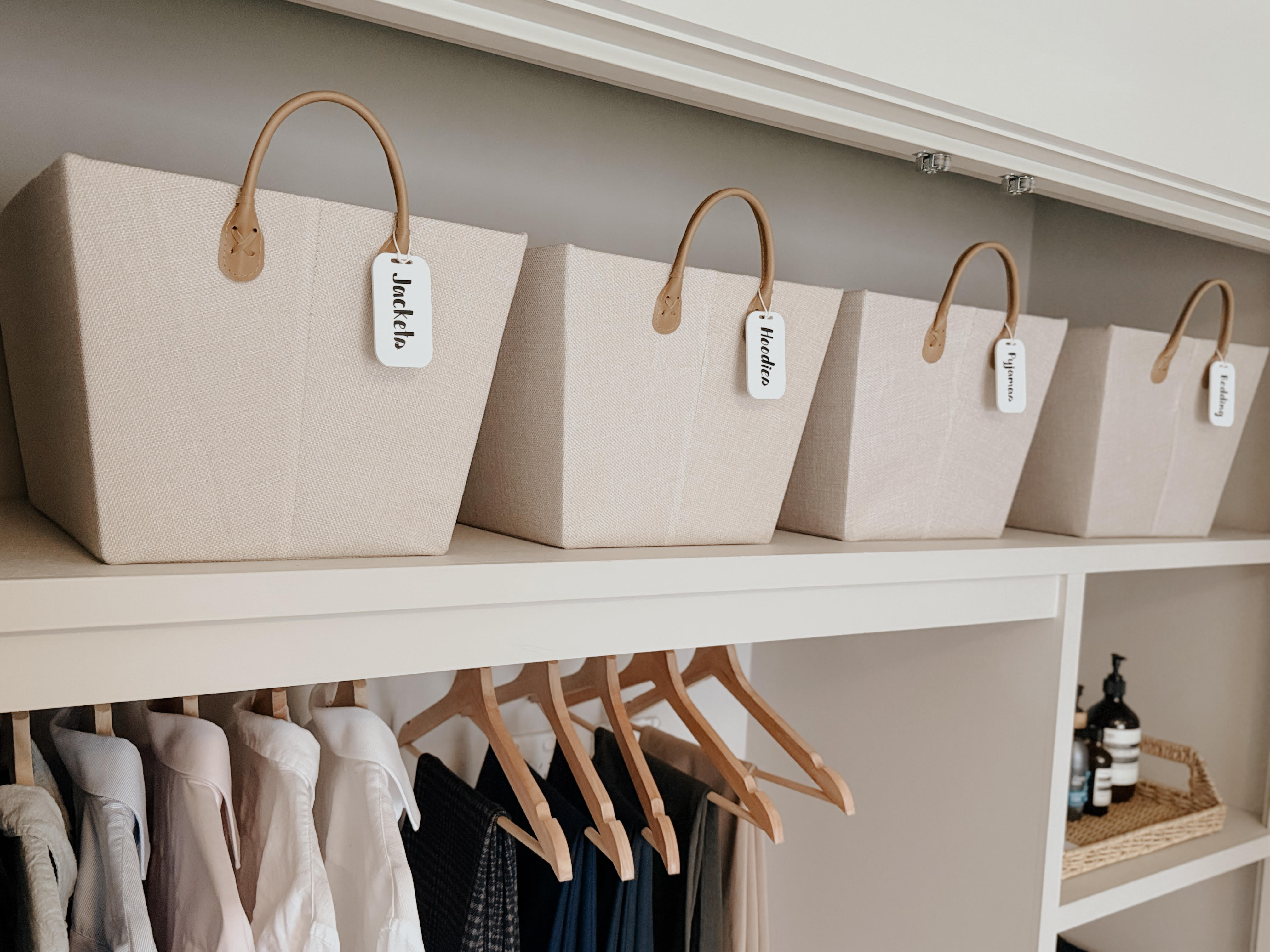 Labelled pantry jars neatly arranged on a shelf